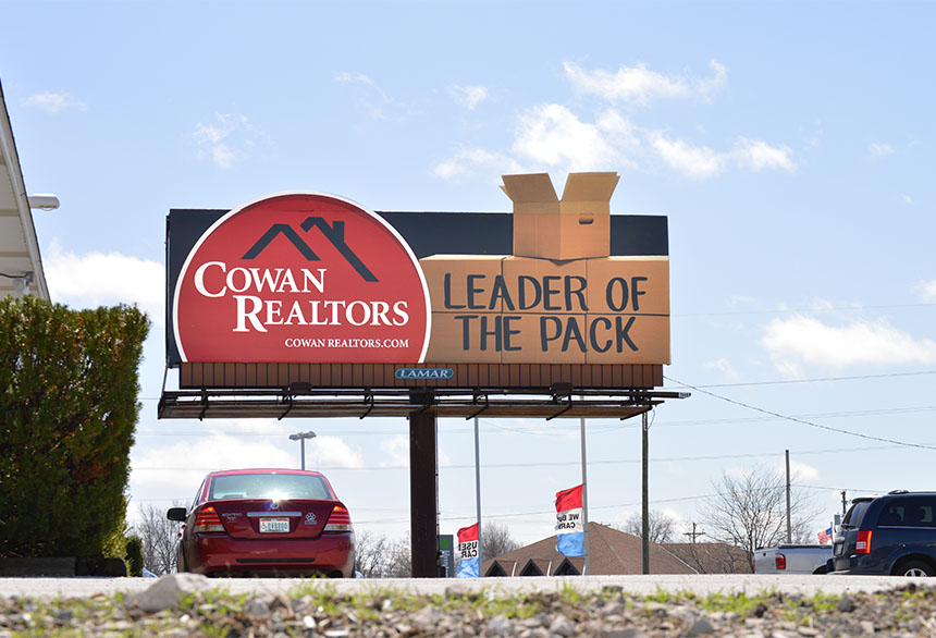 "Leader of the pack" billboard could be improved if they instead shared the value their clients get when working with them.