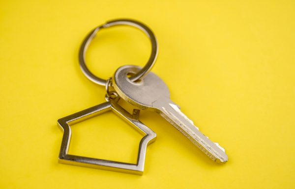 house keys on yellow background